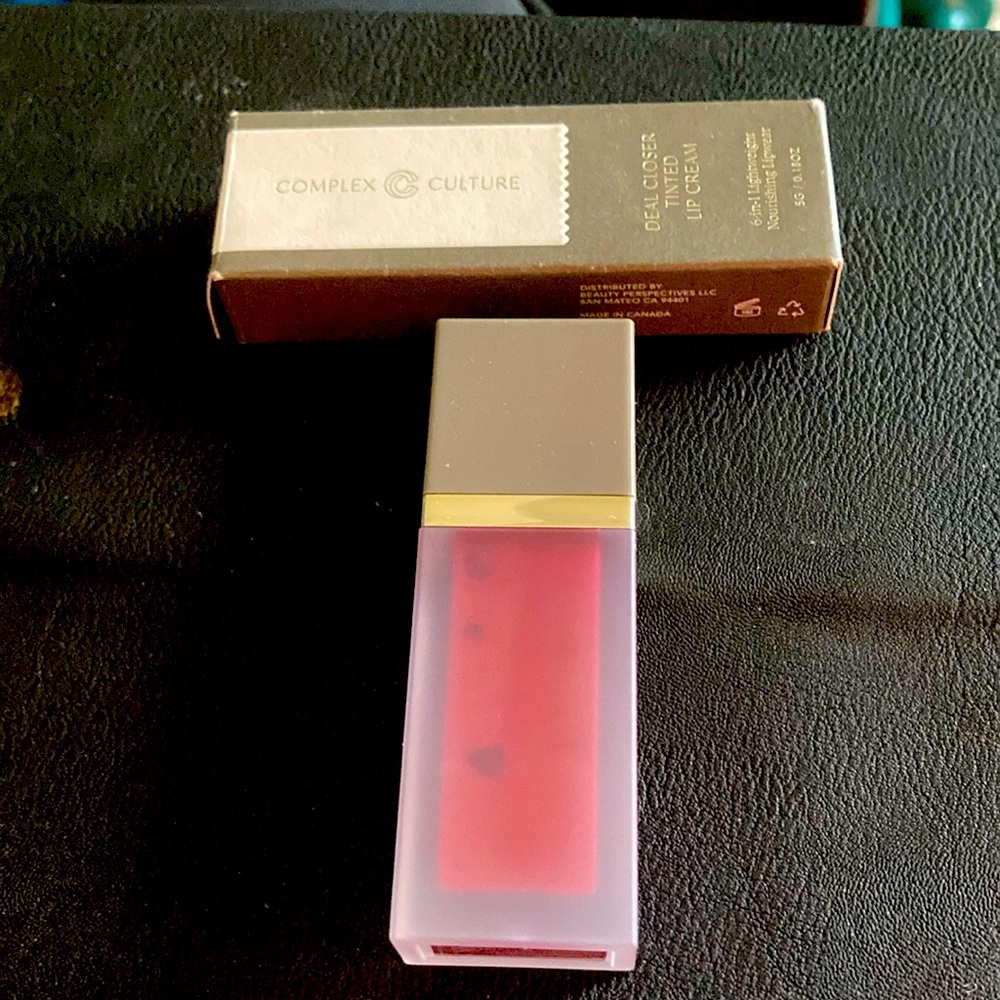 Tinted Lip Cream  pretty shade medium to dark shade.